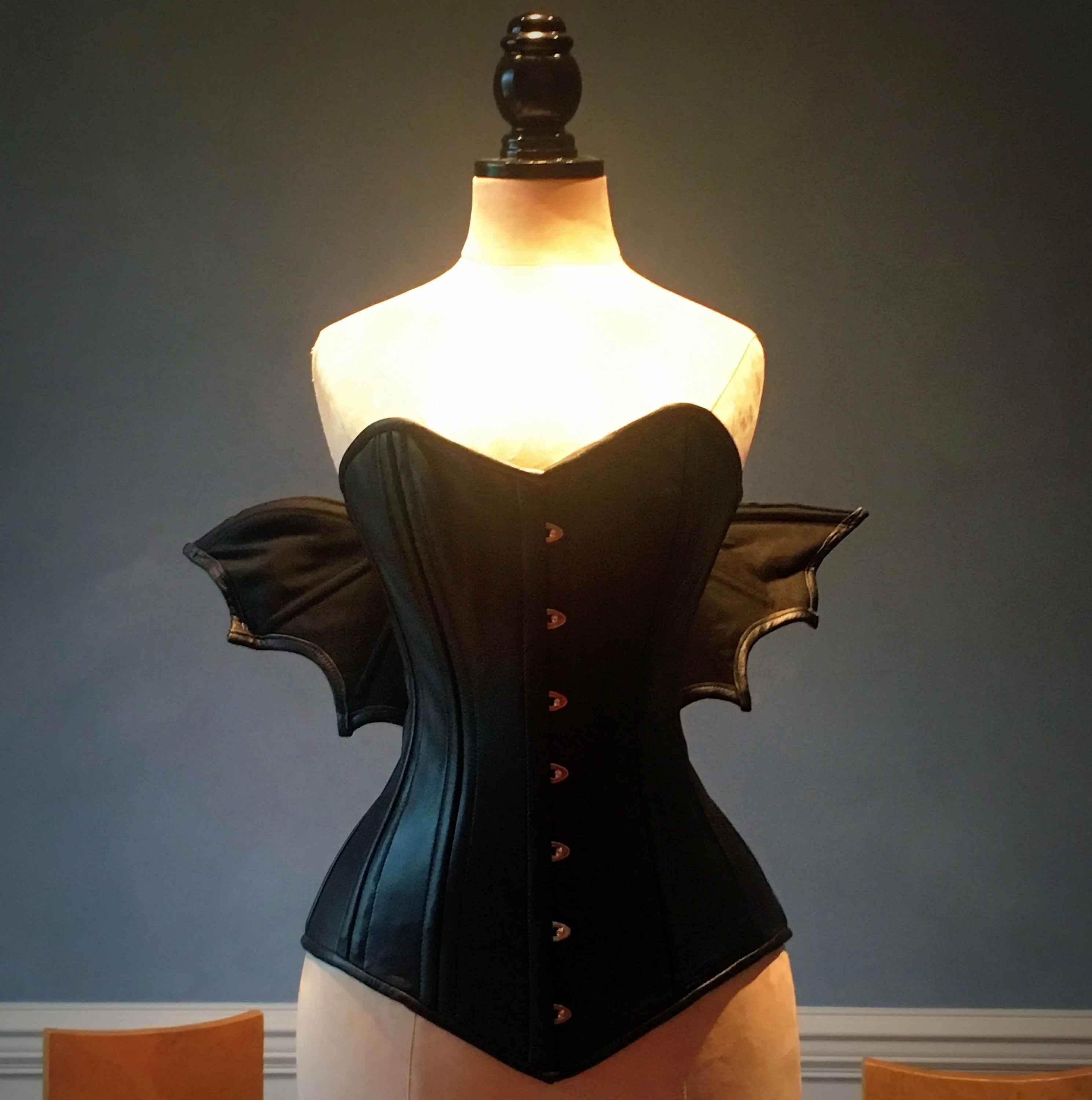 Black real leather corset with bat wings designed by Porcelain Panic, all steel boned